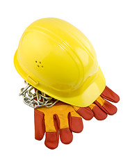 Image showing Yellow hard hat, protective gloves and steel chain isolated