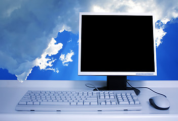 Image showing PC with clouds background