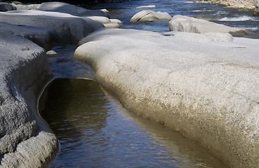 Image showing Rocks in the river.Nice abstract natural background.