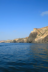 Image showing Mountain on a rocky coastline.View from sea.