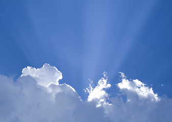 Image showing Sunny clouds with rays of light