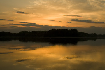 Image showing Romantic sunset on the lake with fog