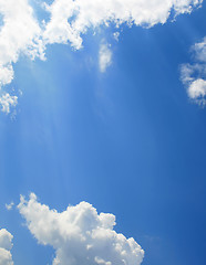 Image showing Sunny clouds with rays of light