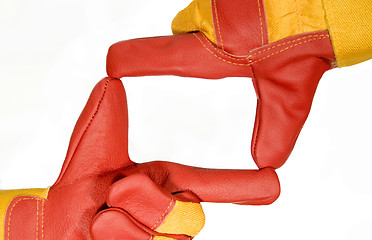 Image showing Frame made from red protective gloves