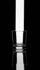 Image showing Empty glass on black. Abstract image