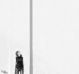 Image showing Girl near the wall - lots of free space