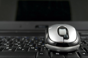 Image showing Mouse on a laptop keyboard