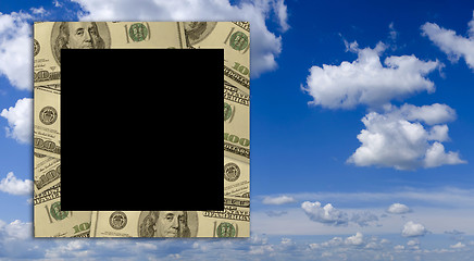 Image showing Empty dollar frame with deep blue sky background