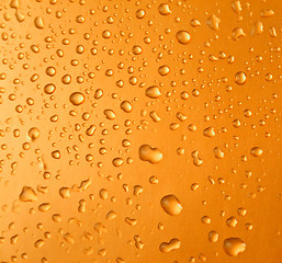 Image showing Abstract orange drops of water background