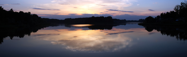 Image showing Romantic sunset on the lake with fog