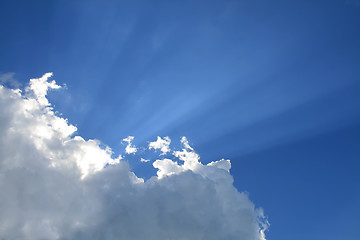 Image showing Sunny clouds with rays of light