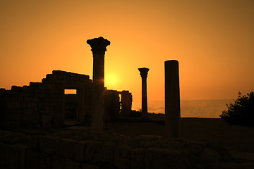 Image showing Ancient ruins during sunset with sea at background
