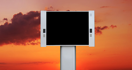 Image showing Blank advertising billboard with sunset sky background