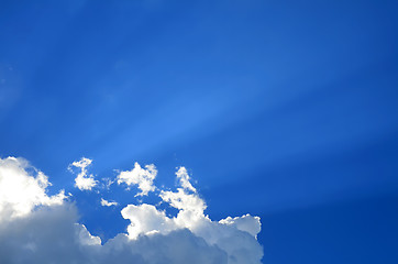 Image showing Sunny clouds with rays of light