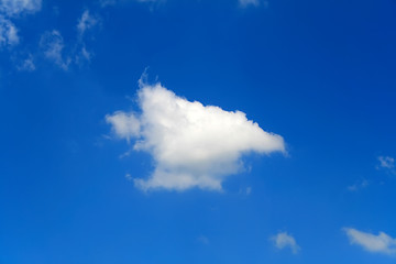 Image showing Puffy clouds on blue sky