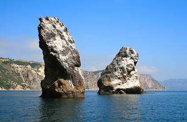 Image showing Mountain on a rocky coastline.View from sea.