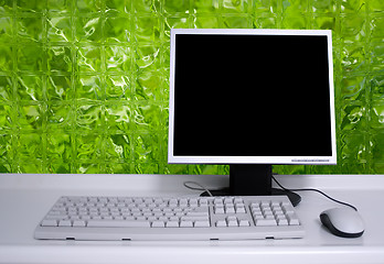 Image showing PC with black desktop and green background