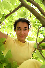 Image showing Young beautiful woman outdoors in sunny park