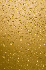 Image showing Gold drops of water