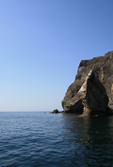 Image showing Mountain on a rocky coastline.View from sea.