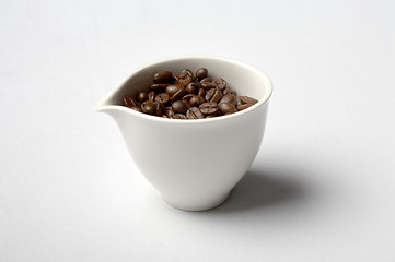 Image showing cup full of colombian coffee beans