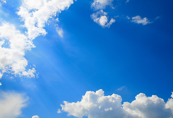 Image showing Sunny clouds with rays of light