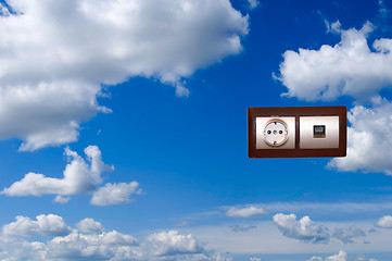 Image showing Electric outlet with blue sky background