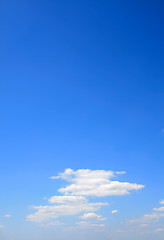 Image showing Puffy clouds on blue sky