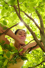 Image showing Young beautiful woman outdoors in sunny park