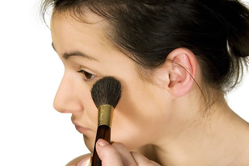 Image showing Sexy girl putting make-up