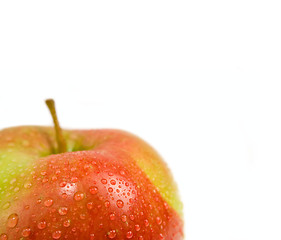 Image showing Fresh ripe apple with drops of water