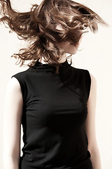 Image showing Fashion portraits of a model with awesome shaking hair