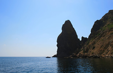 Image showing Mountain on a rocky coastline.View from sea.