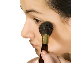 Image showing Sexy girl putting make-up