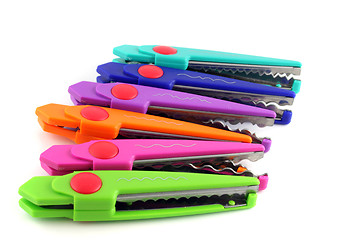 Image showing Brightly colors craft scissors on a white background