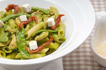 Image showing Italian penne pasta with sundried tomato and basil