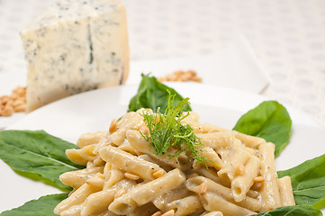 Image showing Italian pasta penne gorgonzola and pine nuts