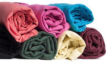 Image showing Rolls of multicolored clothes