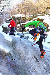 Image showing team of mountaineers heading to the summit