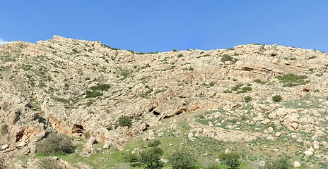 Image showing Texture of a layered sedimentary rock under the blue sky