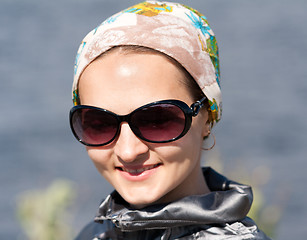 Image showing portrait of beautiful girl in the bandana and sunglasses