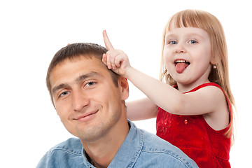 Image showing Little funny girl plays with her dad. Isolate on white.