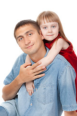 Image showing father and young daughter sitting on the floor