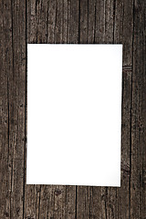 Image showing Blank paper on weathered wood