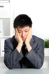 Image showing Despondent Asian businessman