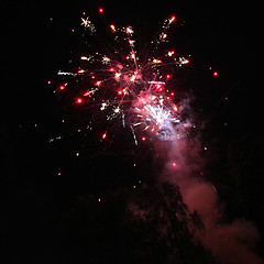 Image showing Colourful red fireworks display
