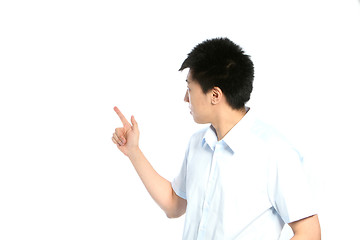 Image showing Asian man pointing behind him