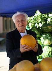 Image showing Old man at the marketplace