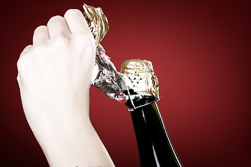 Image showing Opening champagne bottle