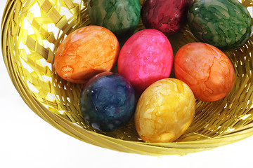 Image showing Colourful painted Easter Eggs in a basket